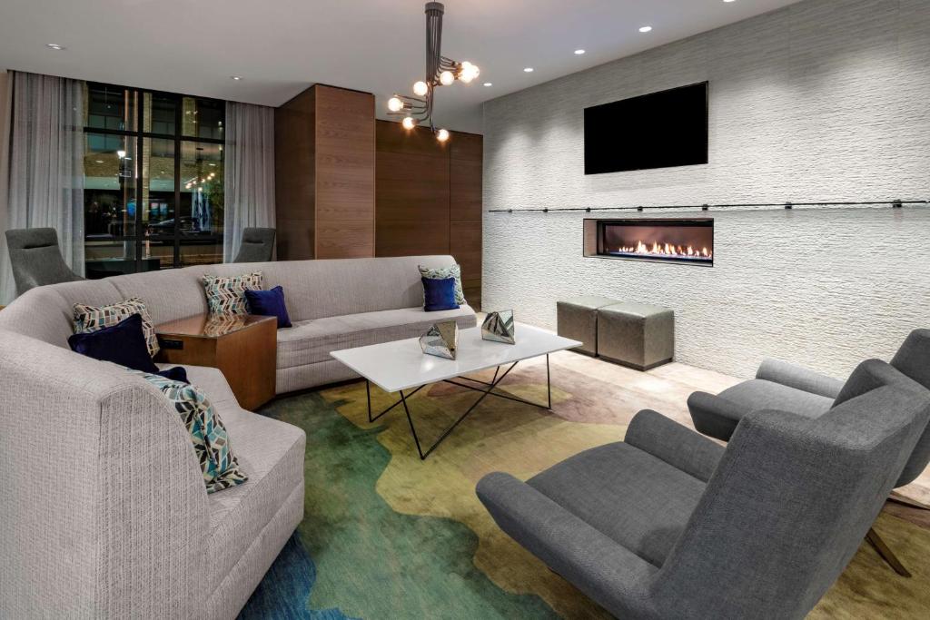 Hyatt Place Denver Downtown Relaxation area with fireplace